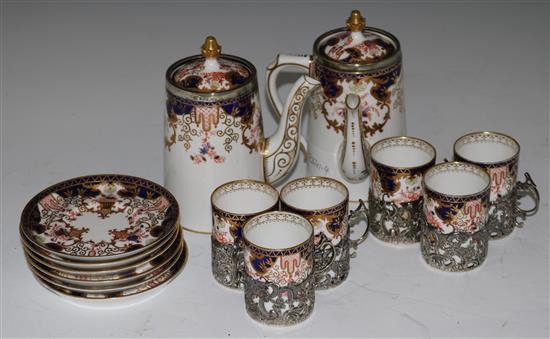 A Royal Crown Derby fourteen piece café au lait set, with silver cup holders